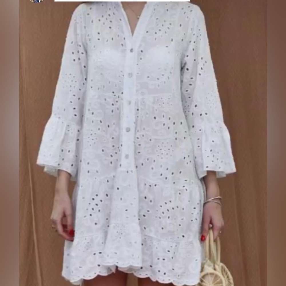 NWT. Made in Italy blue dress. One size 
Never worn 
Excellent condition